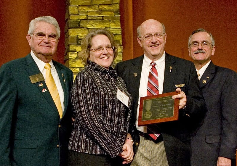 DG 5630 William R. "Bob" Stetter, Ila Ballou (wife), William E. (Bill) Ballou PDG 5630, and award presenter RID Don Mebus (Zone 25-26, PDG 5790)